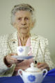 Ruth Stange, Falun WI holding an Alberta Women's Institutes, Cup and Saucer, 